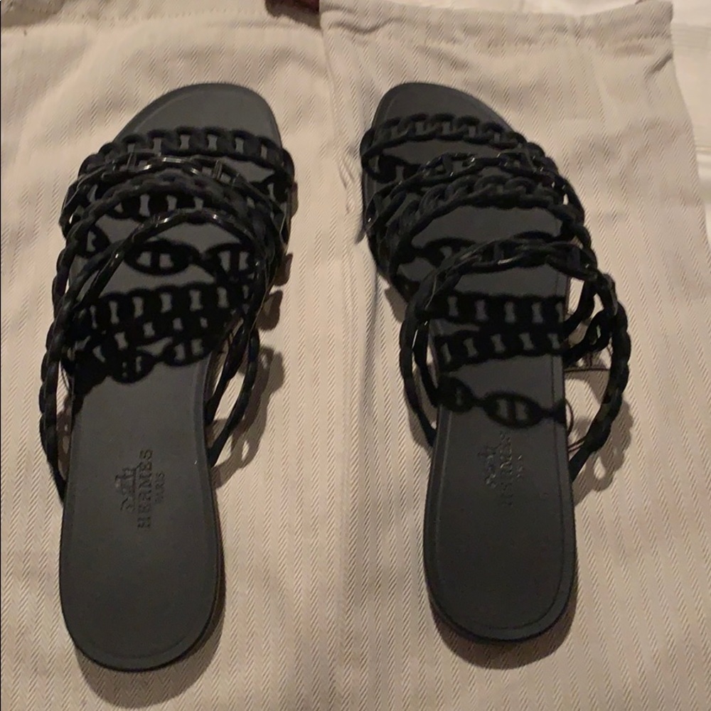 Brand new never worn black rubber Hermes slides.